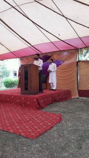 Teachers addressing students on annual day.