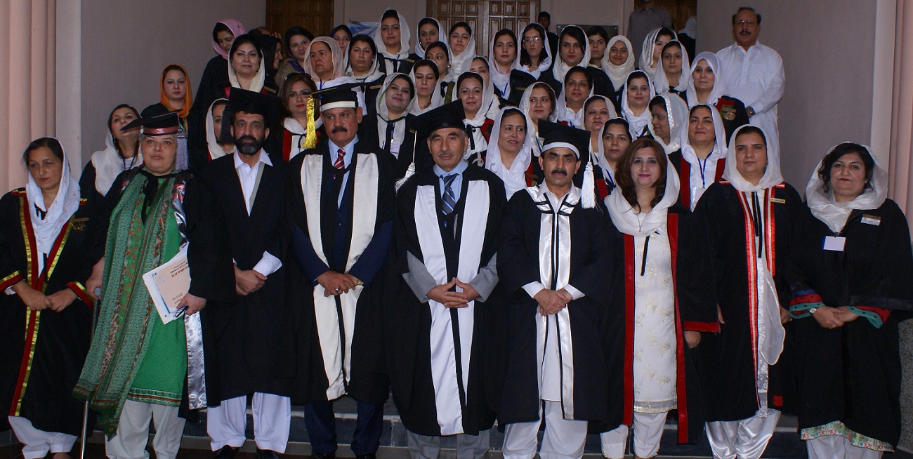 Minister for Higher Education Mr. Mushtaq Ahmed Ghani and VC UoP Prof. Dr. Muhammad Rasul  Jan  in group photo with faculty members of College of Home Economics on the occasion of 17th Convocation