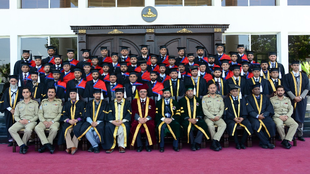 The Vice Chancellor University of Peshawar pose for a group photo with the graduates and staff members of  the School of Artillery having  masters in military science and management degrees at Nowshera  on the occasion of Convocation-2018 on 25th June, 2018.