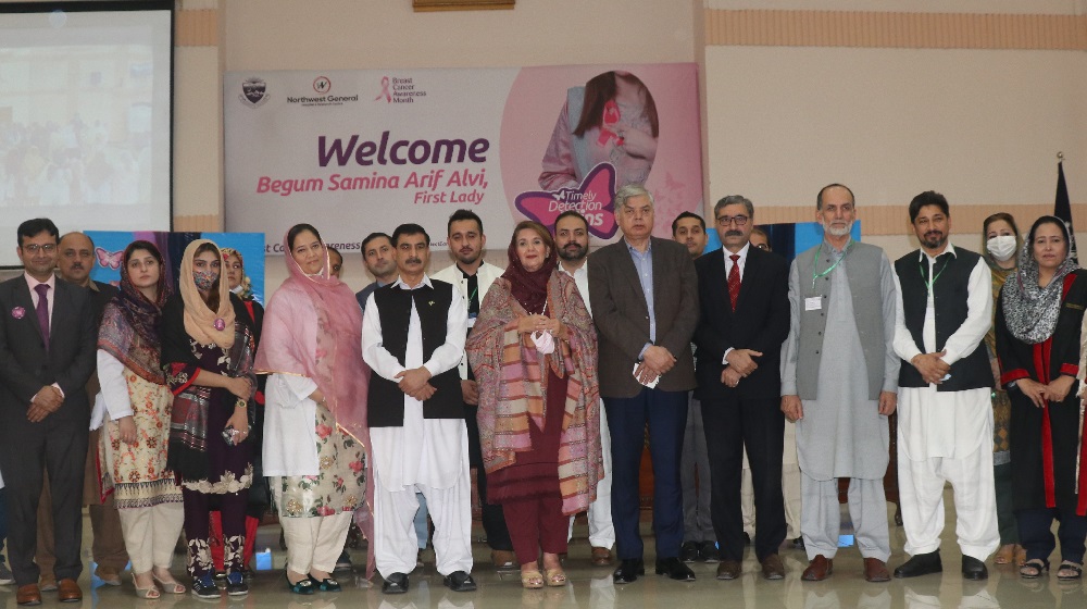 Begum Samina Arif Alvi (1st Lady), Vice Chancellor Prof Dr Muhammad Idrees, CEO North West General Hospital Dr Zia Ur Rehman, Registrar Saifullah Khan and other staff in a group photo at convocation hall after the completion of awareness session.