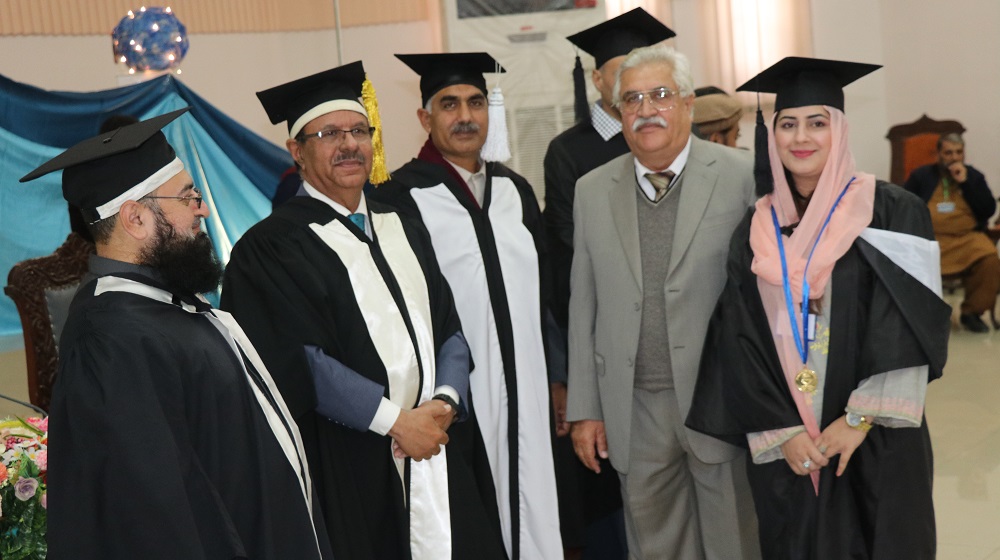 Vice Chancellor University of Peshawar Prof.Dr.Muhammad Asif khan is honouring gold medalist student of Arts & Design Sadia Riaz along her father at the BS Convocation ceremony on 13th February, 2020.