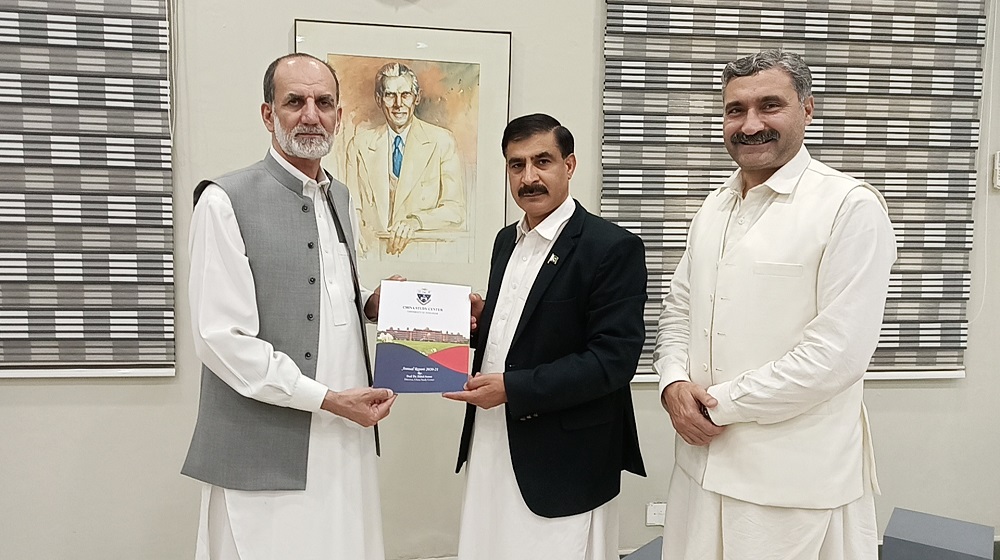 Dean Faculty of Social Sciences and Director China Study Center Prof Dr Zahid Anwar presents an annual report of China Study Center to the Vice Chancellor Prof Dr Muhammad Idrees while accompanied by the registrar Mr Saifullah Khan.