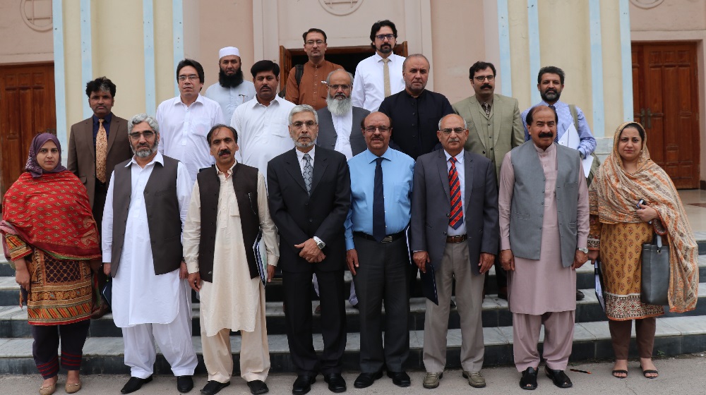 The Vice Chancellor University of Peshawar Prof.Dr.Muhammad Asif Khan is posing with HEC officials, fellow vice chancellors and affiliated colleges heads on the consultative meeting regarding BS semester  on 1st October, 2019