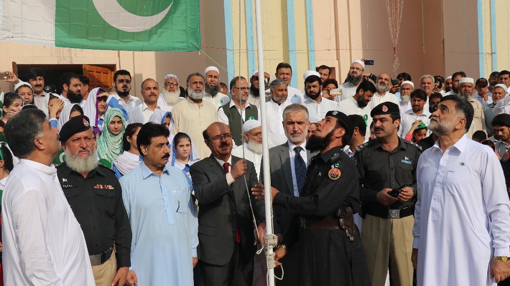 Vice Chancellor UoP Prof. Dr. Muhammad Asif Khan Hoisting National Flag on the Independence Day of Pakistan at the University of Peshawar