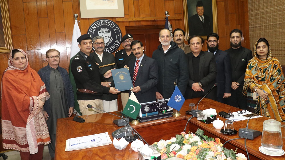 Vice Chancellor Prof Dr Muhammad Idrees and Chief Capital City Police Peshawar Mr Abbas Ahsan exchanging MOU after signing ceremony.