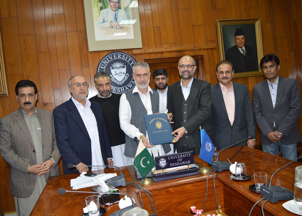VC UoP Prof. Dr. Muhammad Abid and VC Riphah International University Prof. Dr. Muhammad Anis signing MOU at University of Peshawar